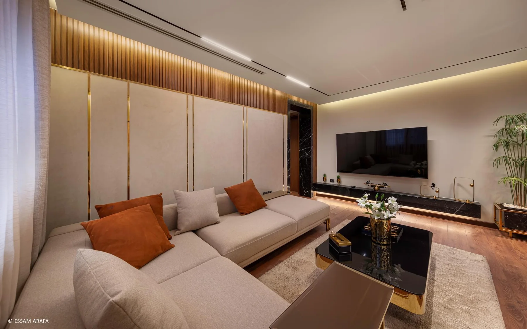Living room with timber slat wall and integrated media joinery